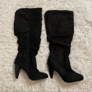 Black Charlotte Russe healed boots.